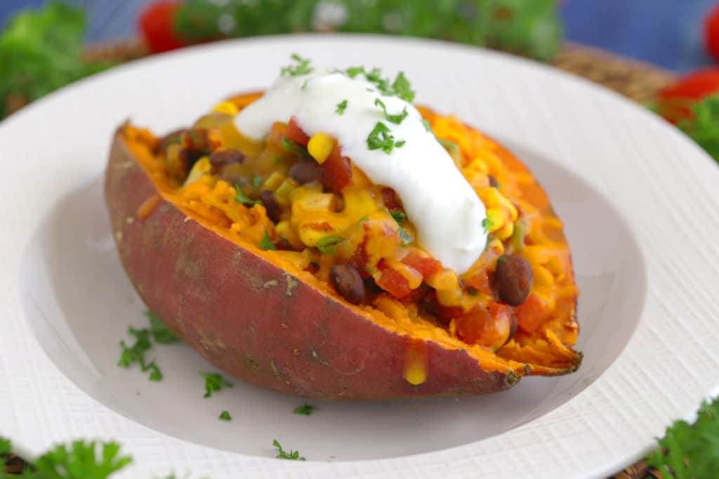 Mexican Stuffed Sweet Potatoes, how to cook a sweet potato in the microwave, how to microwave a sweet potato, vegan stuffed sweet potatoes, how to bake a potato in the microwave, stuffed sweet potato recipe vegetarian