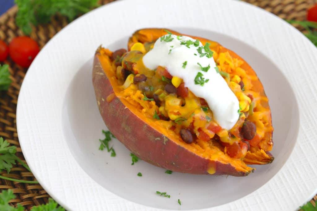 Taco Stuffed Sweet Potatoes, how to cook a sweet potato in the microwave, how to microwave a sweet potato, healthy stuffed sweet potatoes, how to bake a potato in the microwave, stuffed sweet potato recipe vegetarian