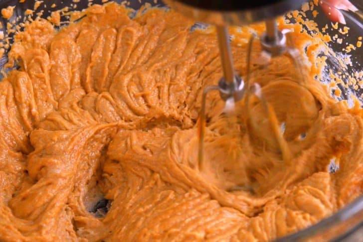 Add sweet potato puree, cinnamon, and vanilla, beating until integrated.