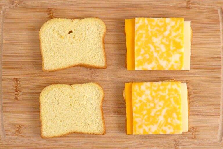 Add 2-3 cheese slices onto brioche bread and assemble sandwiches.