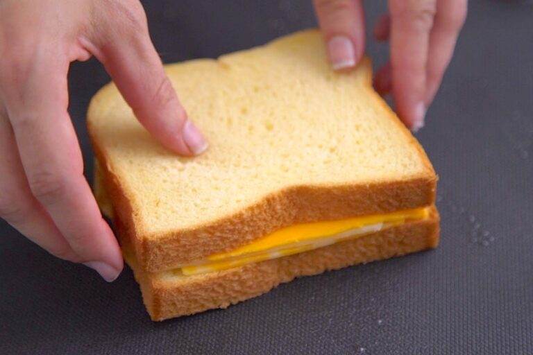 Place sandwich onto preheated griddle, buttered side down.