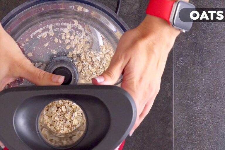 Add rolled oats to a food processor.