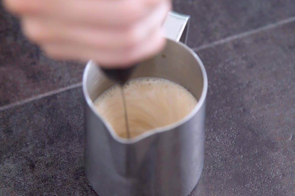 Froth pumpkin cold brew foam until fluffy