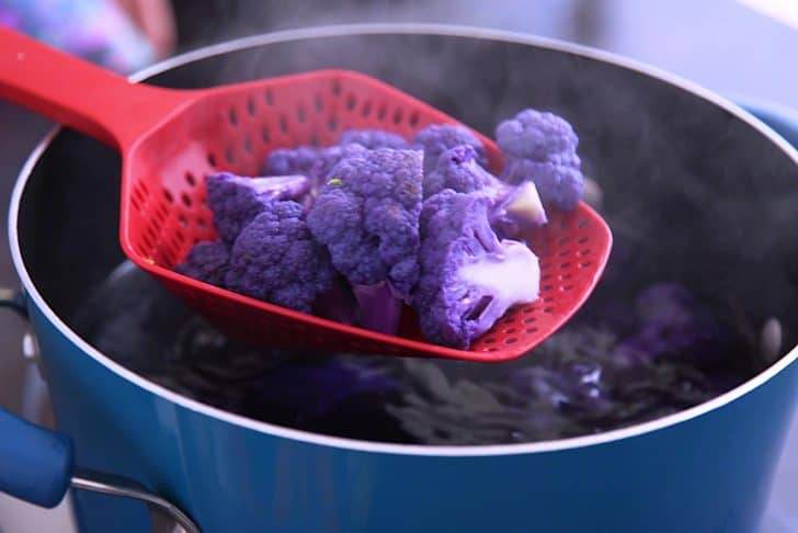 Blanch purple cauliflower separately because its purple color will leach into the water and onto your other veggies!