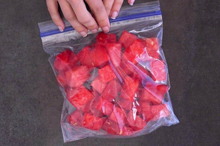 Add cut watermelon to a freezer-safe bag and spread it out into a single layer before freezing.