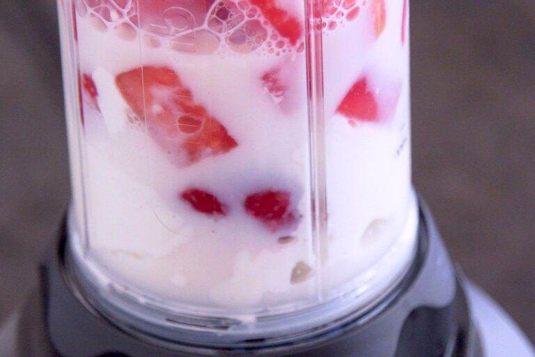 Add watermelon smoothie ingredients into a blender.